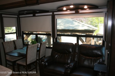 Extra large corner lot, with mature trees.  2021 36 foot Grand on Star Valley RV Golf Course in Wyoming - for sale on GolfHomes.com, golf home, golf lot