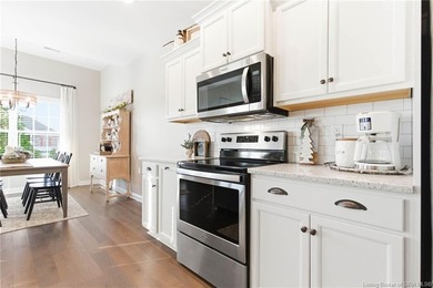 Welcome home to this beautifully designed 3-bedroom, 2-bath, 1 on Champions Pointe Golf Course in Indiana - for sale on GolfHomes.com, golf home, golf lot