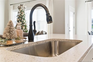 Welcome home to this beautifully designed 3-bedroom, 2-bath, 1 on Champions Pointe Golf Course in Indiana - for sale on GolfHomes.com, golf home, golf lot