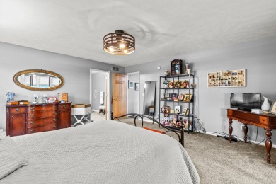 Welcome to your dream home in Canadian Lakes, perfectly situated on Canadian Lakes Country Club-The Royal Course in Michigan - for sale on GolfHomes.com, golf home, golf lot