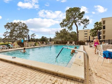 Discover the epitome of condominium living in this bright and on Tarpon Springs Golf Course in Florida - for sale on GolfHomes.com, golf home, golf lot