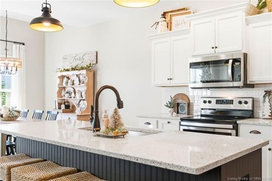 Welcome home to this beautifully designed 3-bedroom, 2-bath, 1 on Champions Pointe Golf Course in Indiana - for sale on GolfHomes.com, golf home, golf lot