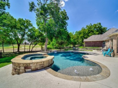 This turn-key home in a master-planned golf course community on Jim Boggs in Texas - for sale on GolfHomes.com, golf home, golf lot