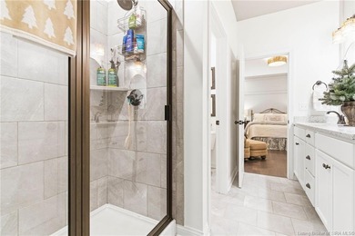 Welcome home to this beautifully designed 3-bedroom, 2-bath, 1 on Champions Pointe Golf Course in Indiana - for sale on GolfHomes.com, golf home, golf lot