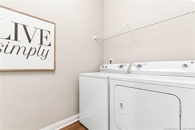 Welcome home to this beautifully designed 3-bedroom, 2-bath, 1 on Champions Pointe Golf Course in Indiana - for sale on GolfHomes.com, golf home, golf lot