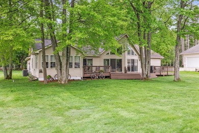 Welcome to your dream home in Canadian Lakes, perfectly situated on Canadian Lakes Country Club-The Royal Course in Michigan - for sale on GolfHomes.com, golf home, golf lot