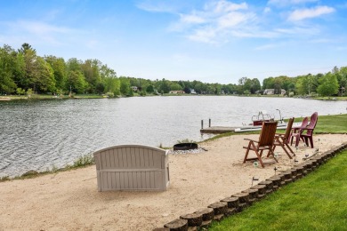 Welcome to your dream home in Canadian Lakes, perfectly situated on Canadian Lakes Country Club-The Royal Course in Michigan - for sale on GolfHomes.com, golf home, golf lot