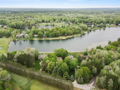 Welcome to your dream home in Canadian Lakes, perfectly situated on Canadian Lakes Country Club-The Royal Course in Michigan - for sale on GolfHomes.com, golf home, golf lot