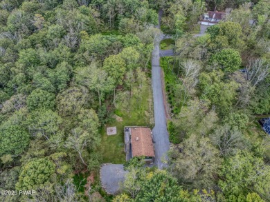 Enjoy the good life in Tanglwood Lakes at Lake Wallenpaupack on Paupack Hills Golf and Country Club in Pennsylvania - for sale on GolfHomes.com, golf home, golf lot