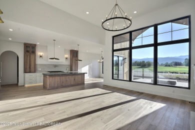 Welcome to your dream oasis nestled within the prestigious Teton on Teton Springs Resort and Club in Idaho - for sale on GolfHomes.com, golf home, golf lot