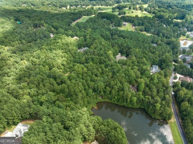Enjoy Mountain and Pond Views from this 1.66 Acre tract composed on The Orchard Golf and Country Club in Georgia - for sale on GolfHomes.com, golf home, golf lot