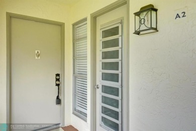 Hi, I'm your dream 2 bed/2 bath newly renovated condo, and on Wynmoor Golf Course in Florida - for sale on GolfHomes.com, golf home, golf lot