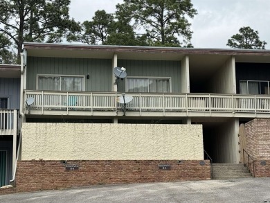 Golf View Villa condo overlooking Sam Rayburn Resort golf on Rayburn Country Club in Texas - for sale on GolfHomes.com, golf home, golf lot