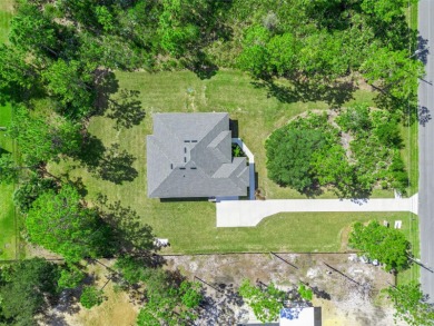 Where Luxury Meets Comfort -- Your Dream Home Awaits on a Full on Wedgefield Golf Club in Florida - for sale on GolfHomes.com, golf home, golf lot