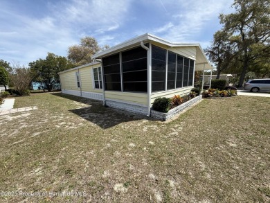 Picture this, a clean move in ready home tucked away in the on High Point Golf Club, Inc. in Florida - for sale on GolfHomes.com, golf home, golf lot