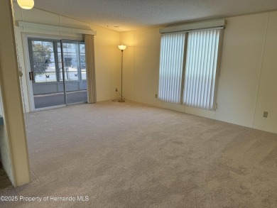Picture this, a clean move in ready home tucked away in the on High Point Golf Club, Inc. in Florida - for sale on GolfHomes.com, golf home, golf lot