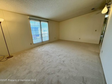 Picture this, a clean move in ready home tucked away in the on High Point Golf Club, Inc. in Florida - for sale on GolfHomes.com, golf home, golf lot