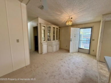 Picture this, a clean move in ready home tucked away in the on High Point Golf Club, Inc. in Florida - for sale on GolfHomes.com, golf home, golf lot