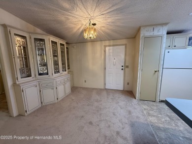 Picture this, a clean move in ready home tucked away in the on High Point Golf Club, Inc. in Florida - for sale on GolfHomes.com, golf home, golf lot
