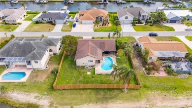 POOL and NEW ROOF!!!  Charming 3/2 Home in the Heart of Apollo on Apollo Beach Golf and Sea Club in Florida - for sale on GolfHomes.com, golf home, golf lot