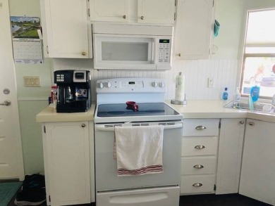 This home is in a 55 plus senior park with a monthly lot rent of on Crystal Lake Club in Florida - for sale on GolfHomes.com, golf home, golf lot