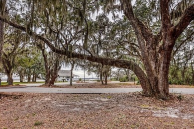 Build your dream home on this prime lot in gated Sutherland on Sapelo Hammock Golf Club in Georgia - for sale on GolfHomes.com, golf home, golf lot