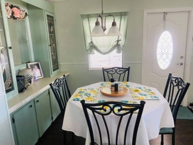 This home is in a 55 plus senior park with a monthly lot rent of on Crystal Lake Club in Florida - for sale on GolfHomes.com, golf home, golf lot