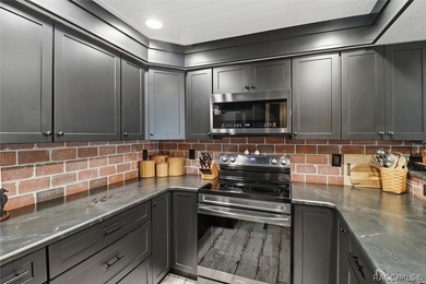 You have to come take a look at this beautifully renovated top on Plantation Inn and Golf Resort  in Florida - for sale on GolfHomes.com, golf home, golf lot