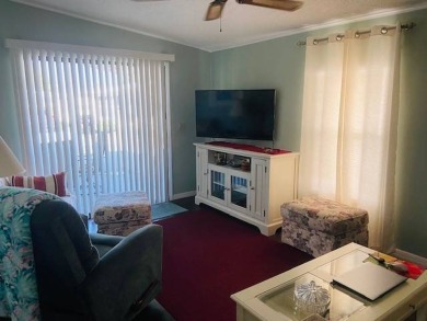 This home is in a 55 plus senior park with a monthly lot rent of on Crystal Lake Club in Florida - for sale on GolfHomes.com, golf home, golf lot