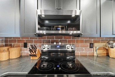 You have to come take a look at this beautifully renovated top on Plantation Inn and Golf Resort  in Florida - for sale on GolfHomes.com, golf home, golf lot