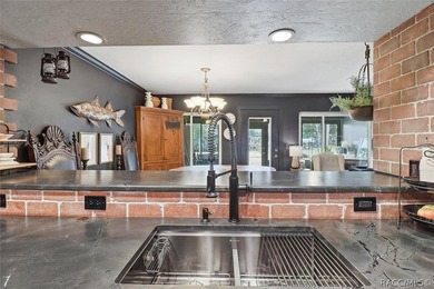 You have to come take a look at this beautifully renovated top on Plantation Inn and Golf Resort  in Florida - for sale on GolfHomes.com, golf home, golf lot