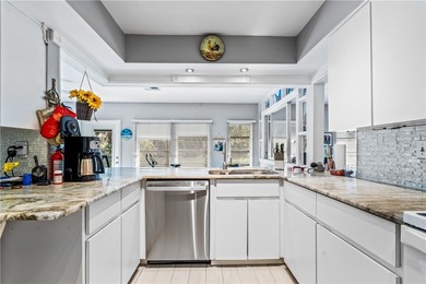 Beautifully maintained concrete block home with split plan on The American Golf Club in Florida - for sale on GolfHomes.com, golf home, golf lot