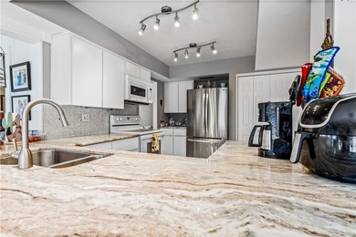 Beautifully maintained concrete block home with split plan on The American Golf Club in Florida - for sale on GolfHomes.com, golf home, golf lot