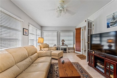 Beautifully maintained concrete block home with split plan on The American Golf Club in Florida - for sale on GolfHomes.com, golf home, golf lot