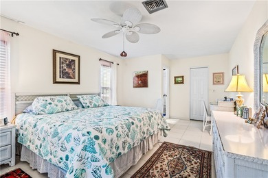 Beautifully maintained concrete block home with split plan on The American Golf Club in Florida - for sale on GolfHomes.com, golf home, golf lot