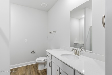 The Kent is a stunning open-concept home designed for effortless on Harbour Point Golf Club in North Carolina - for sale on GolfHomes.com, golf home, golf lot