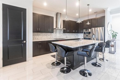 Exquisite Modern Retreat in Lakewood Ranch Country Club East - on Ritz-Carlton Members Golf Club in Florida - for sale on GolfHomes.com, golf home, golf lot