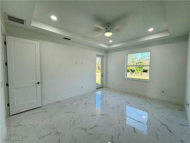 Discover this stunning NEW CONSTRUCTION HOME, ideally situated on Burnt Store Golf Club in Florida - for sale on GolfHomes.com, golf home, golf lot