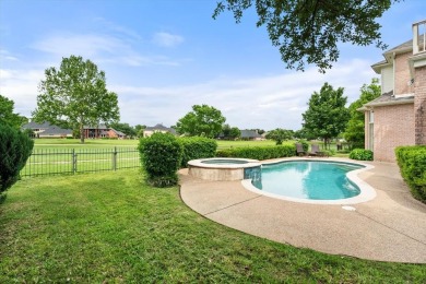 Welcome to this stunning custom-built home overlooking the 17th on Walnut Creek Country Club in Texas - for sale on GolfHomes.com, golf home, golf lot