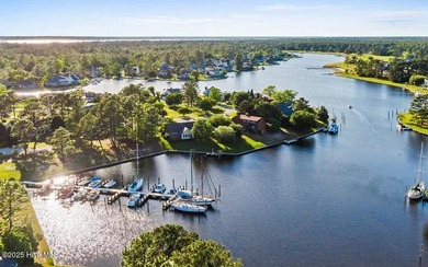 The Kent is a stunning open-concept home designed for effortless on Harbour Point Golf Club in North Carolina - for sale on GolfHomes.com, golf home, golf lot