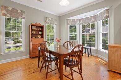 Charming Lowcountry Home on the Golf Course  Nestled in the on Wedgefield Plantation Golf Club in South Carolina - for sale on GolfHomes.com, golf home, golf lot