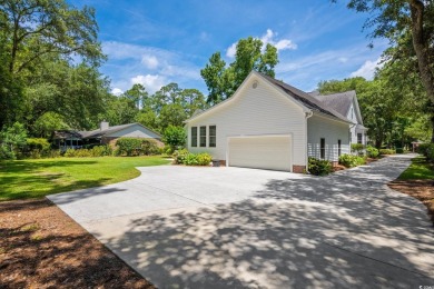 Charming Lowcountry Home on the Golf Course  Nestled in the on Wedgefield Plantation Golf Club in South Carolina - for sale on GolfHomes.com, golf home, golf lot