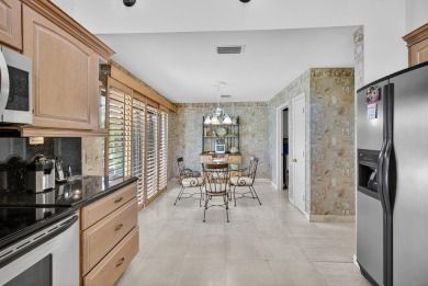 This expanded 500 Model Home is Situated on a beautiful and on Seagate Country Club in Florida - for sale on GolfHomes.com, golf home, golf lot