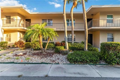 Enjoy peaceful unobstructed views of the lake and golf course on Palm Aire Country Club of Sarasota in Florida - for sale on GolfHomes.com, golf home, golf lot