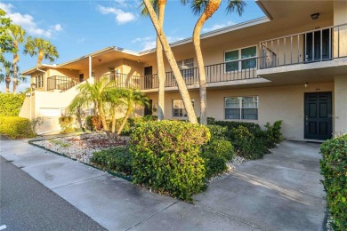 Enjoy peaceful unobstructed views of the lake and golf course on Palm Aire Country Club of Sarasota in Florida - for sale on GolfHomes.com, golf home, golf lot