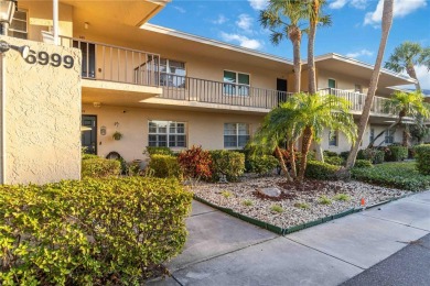 Enjoy peaceful unobstructed views of the lake and golf course on Palm Aire Country Club of Sarasota in Florida - for sale on GolfHomes.com, golf home, golf lot