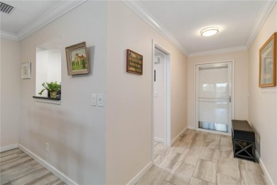 Enjoy peaceful unobstructed views of the lake and golf course on Palm Aire Country Club of Sarasota in Florida - for sale on GolfHomes.com, golf home, golf lot