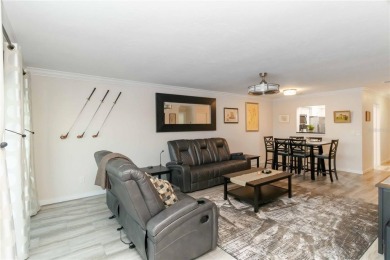 Enjoy peaceful unobstructed views of the lake and golf course on Palm Aire Country Club of Sarasota in Florida - for sale on GolfHomes.com, golf home, golf lot