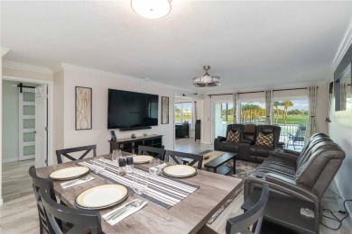 Enjoy peaceful unobstructed views of the lake and golf course on Palm Aire Country Club of Sarasota in Florida - for sale on GolfHomes.com, golf home, golf lot