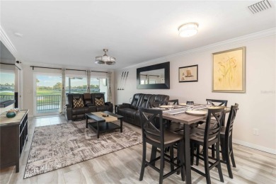 Enjoy peaceful unobstructed views of the lake and golf course on Palm Aire Country Club of Sarasota in Florida - for sale on GolfHomes.com, golf home, golf lot